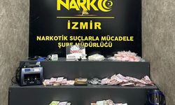 İzmir'de uyuşturucu baskınında milyonlarca lira döviz ele geçirildi