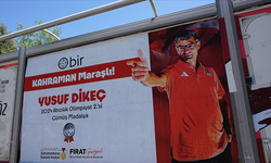 Yusuf Dikeç'in atış pozisyonu billboardları süsledi